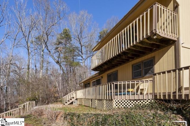 view of home's exterior featuring a deck