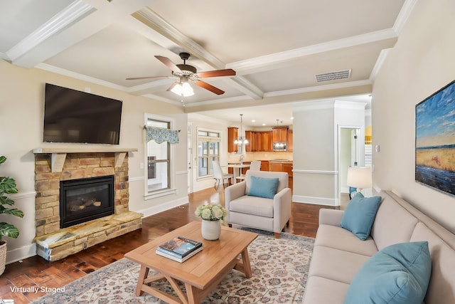 living room featuring coffered ceiling, a fireplace, dark wood-type flooring, and beamed ceiling