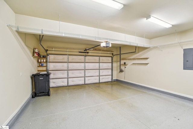 garage featuring a garage door opener and electric panel