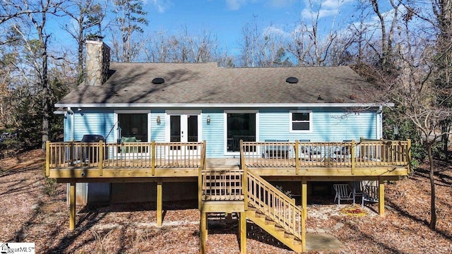 rear view of house with a deck