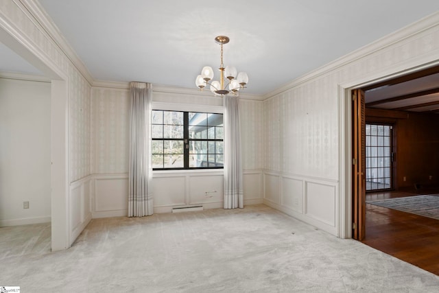 unfurnished dining area with crown molding, carpet floors, a notable chandelier, and baseboard heating