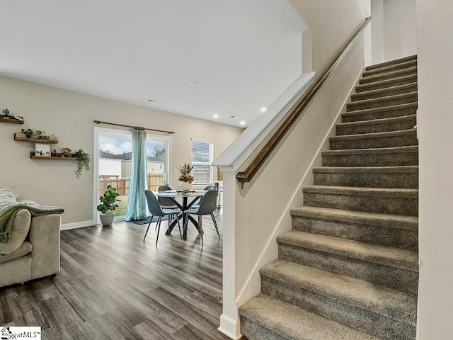 staircase featuring hardwood / wood-style flooring