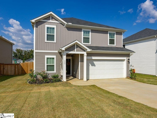 craftsman house featuring a garage and a front lawn