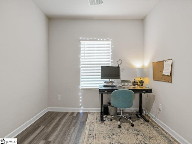 office area with hardwood / wood-style floors