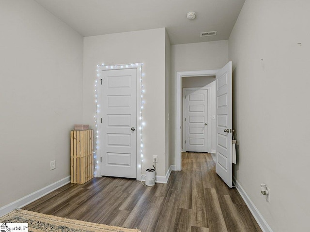 interior space with dark wood-type flooring