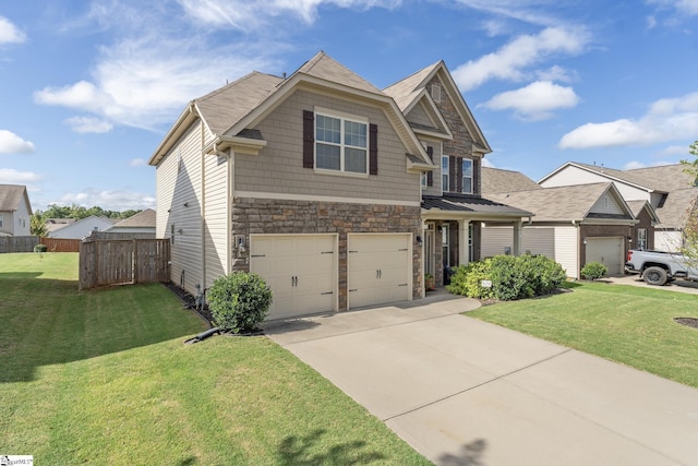 view of front of property featuring a garage and a front lawn