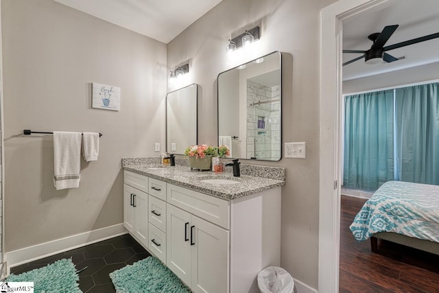 bathroom featuring vanity and ceiling fan