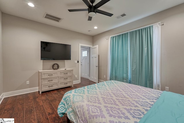 bedroom featuring ceiling fan and dark hardwood / wood-style flooring