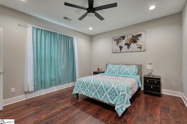 bedroom featuring dark wood-type flooring and ceiling fan