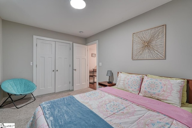 carpeted bedroom with a closet