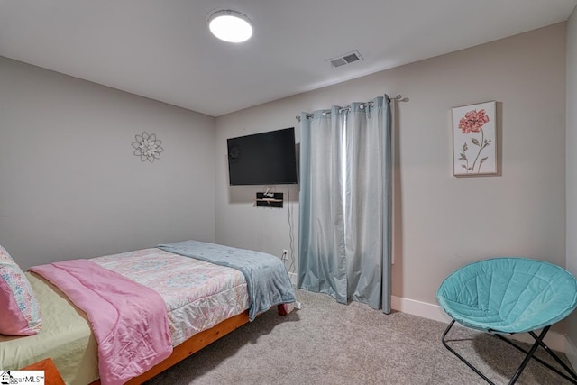 bedroom featuring carpet