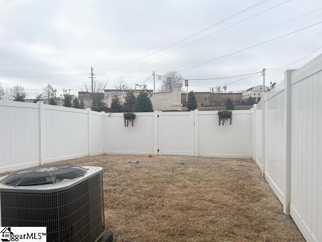 view of yard featuring central AC