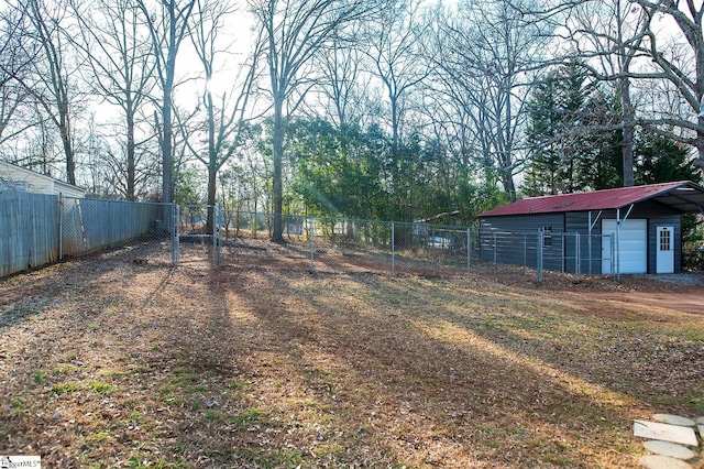 view of yard featuring an outbuilding and a carport