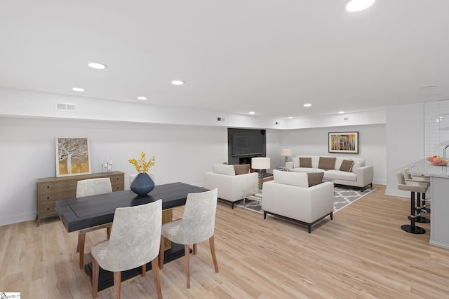 dining room featuring light hardwood / wood-style flooring