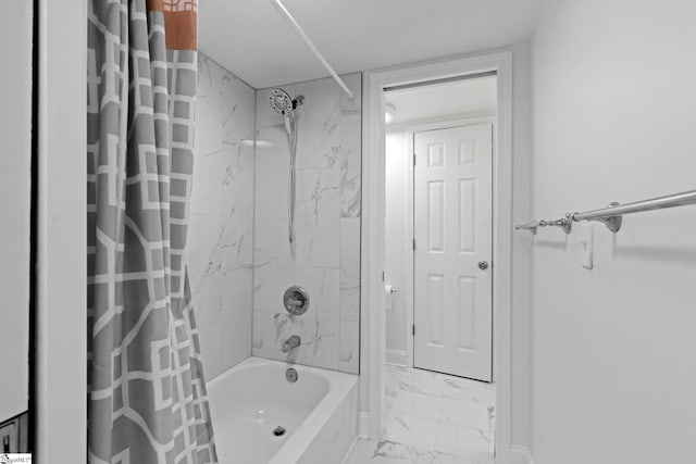 bathroom with shower / tub combo with curtain