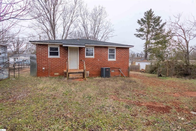 back of property with central air condition unit