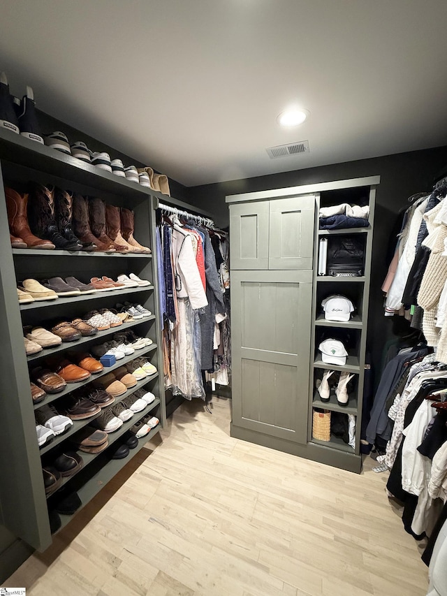 spacious closet with light wood-type flooring