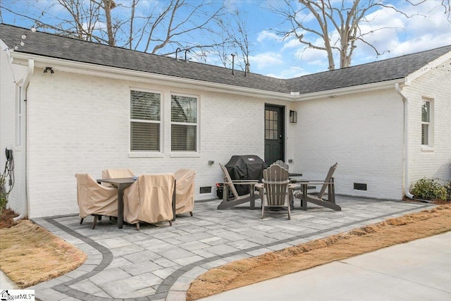 rear view of house featuring a patio