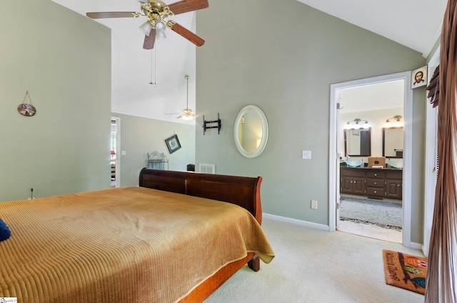 carpeted bedroom featuring ceiling fan, connected bathroom, and high vaulted ceiling