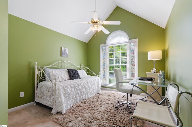 bedroom with lofted ceiling, light colored carpet, and ceiling fan