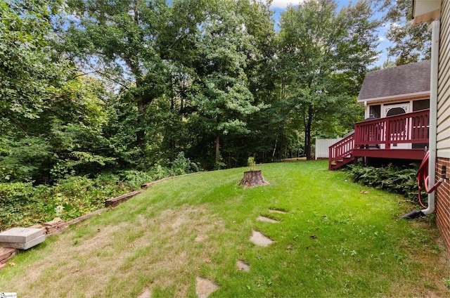 view of yard featuring a deck