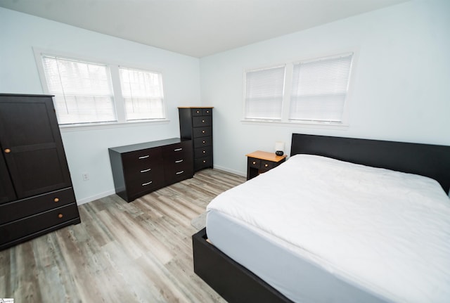 bedroom featuring light hardwood / wood-style flooring