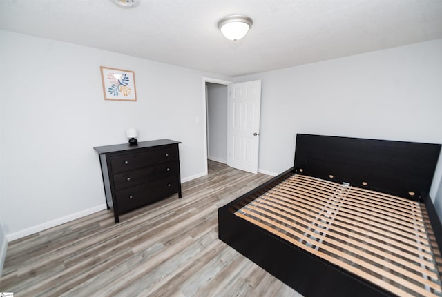 bedroom featuring light hardwood / wood-style flooring