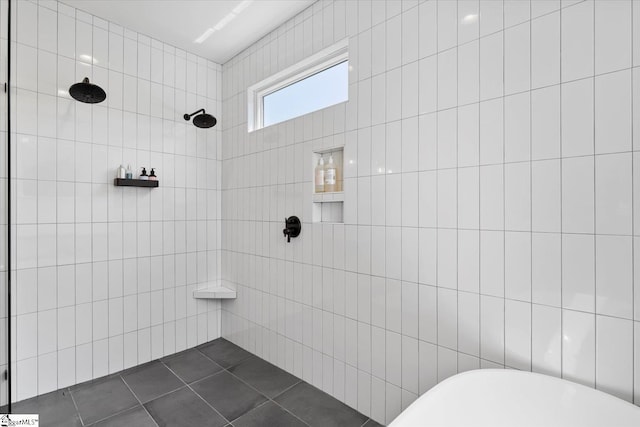 bathroom featuring tile patterned flooring, separate shower and tub, and tile walls