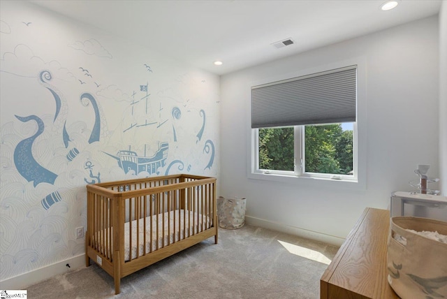 bedroom with light colored carpet