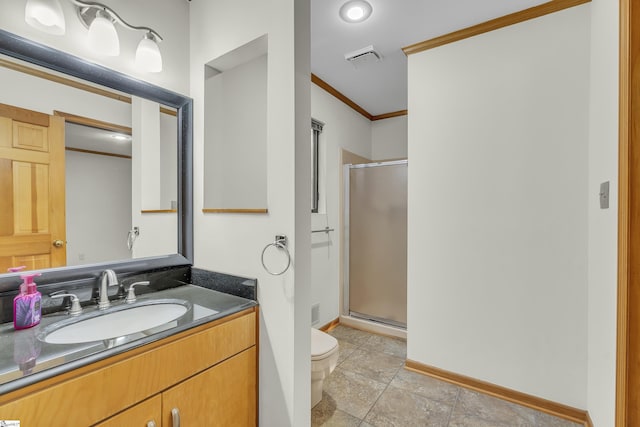 bathroom featuring walk in shower, ornamental molding, toilet, and vanity