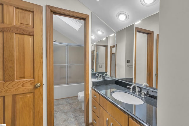 full bathroom with vanity, vaulted ceiling, shower / bath combination with glass door, and toilet