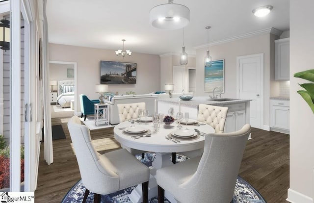 dining space with crown molding, dark hardwood / wood-style floors, a chandelier, and sink