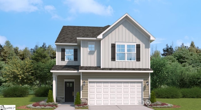 view of front facade with a garage and a front lawn