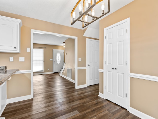 entryway featuring dark hardwood / wood-style floors