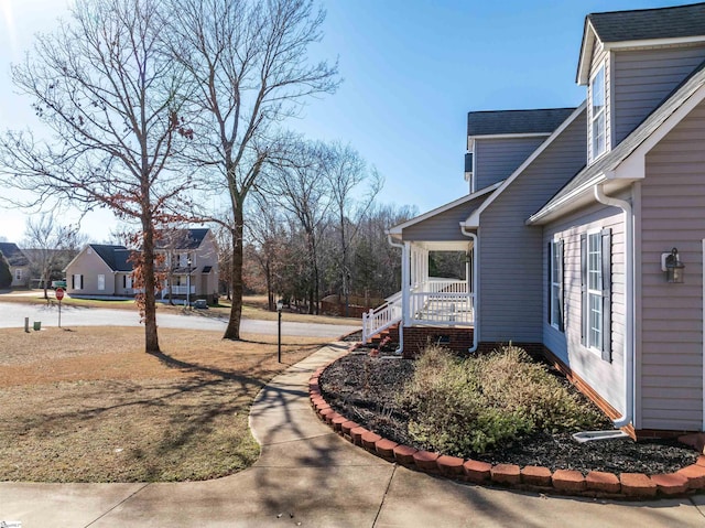 view of yard featuring a porch