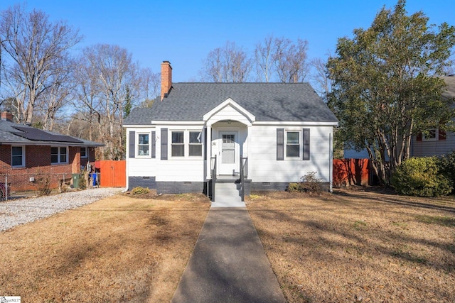 view of front of home featuring a front yard