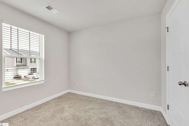 empty room featuring carpet