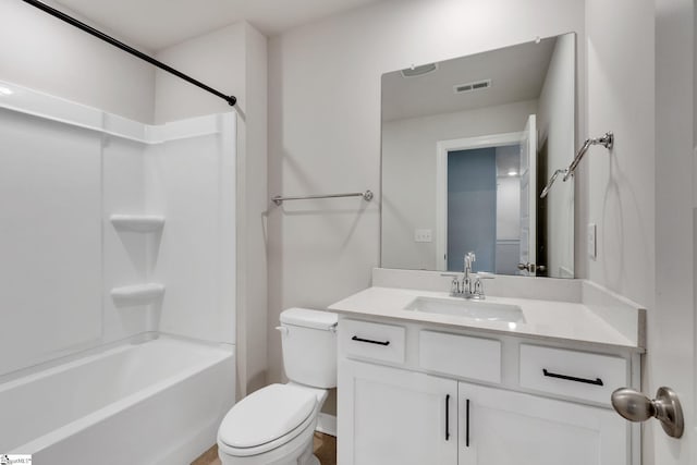 full bathroom with vanity, shower / washtub combination, and toilet