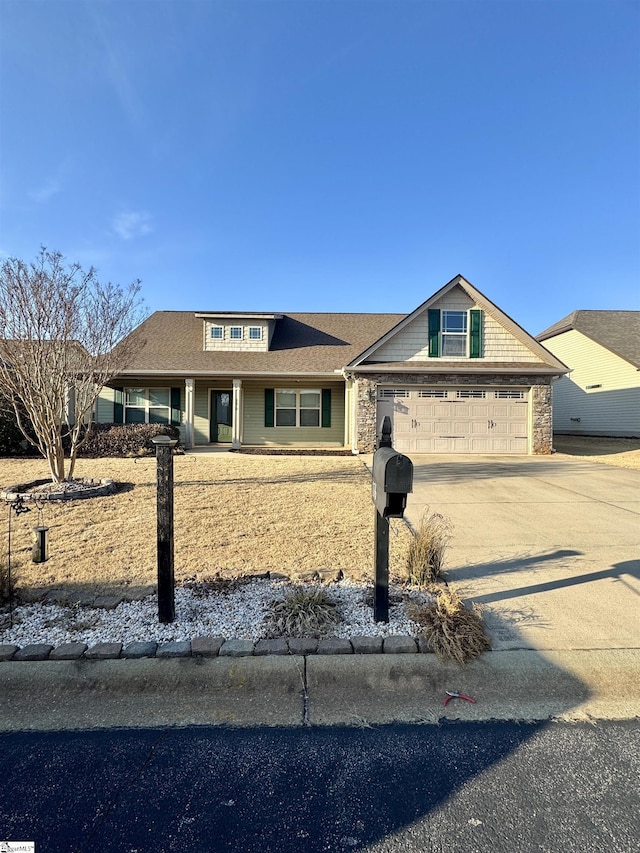 view of front of property with a garage