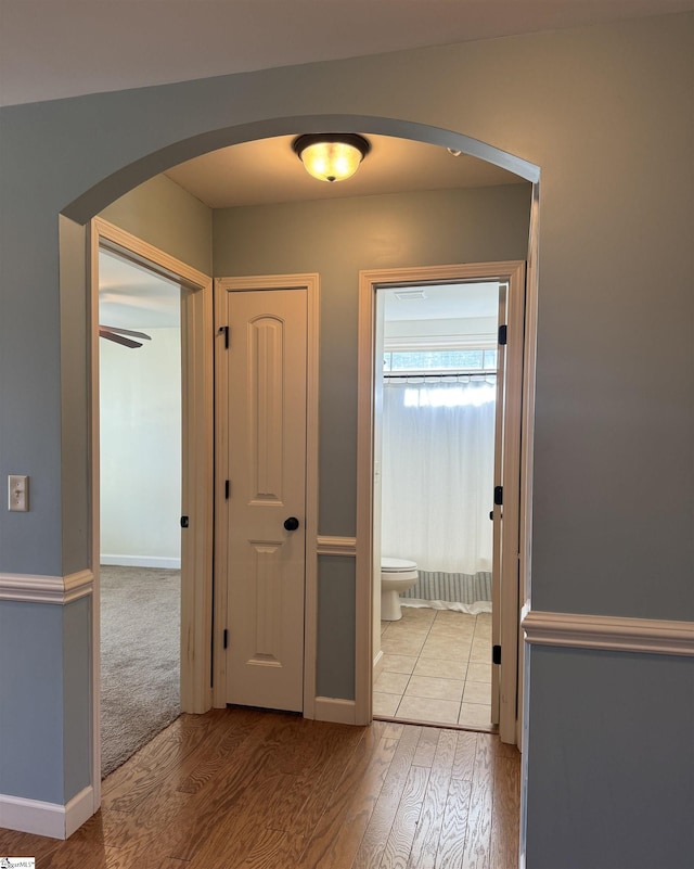 corridor featuring light hardwood / wood-style flooring