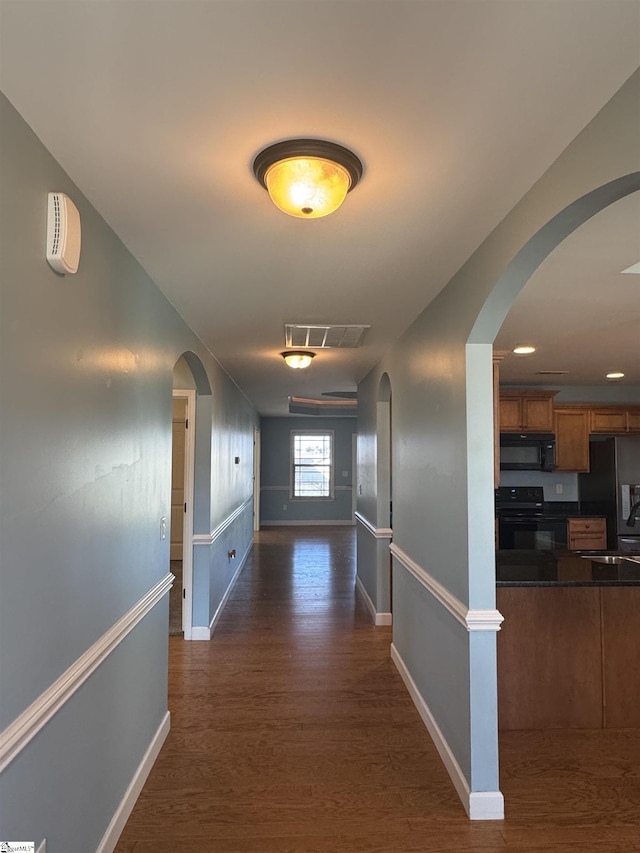 hall featuring dark hardwood / wood-style floors