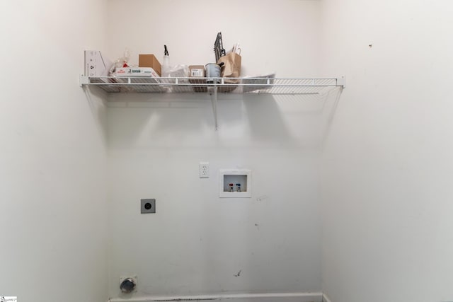 clothes washing area with washer hookup and electric dryer hookup