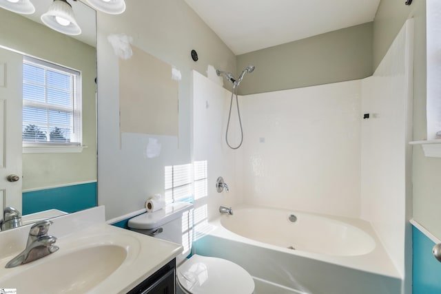 full bathroom featuring vanity, shower / bathtub combination, and toilet