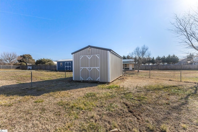 view of outdoor structure with a yard