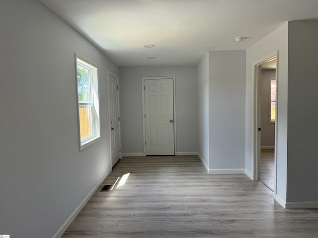 hallway featuring light hardwood / wood-style floors