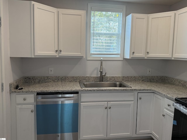 kitchen with white cabinetry, sink, stainless steel dishwasher, black range with electric stovetop, and light stone countertops