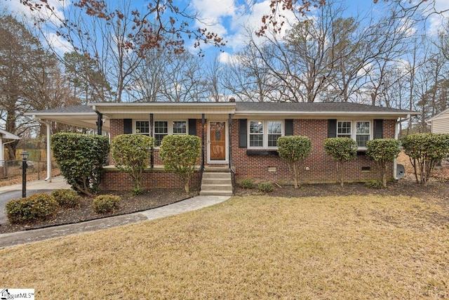 single story home with a carport and a front yard