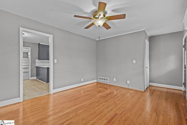 interior space featuring ceiling fan and light wood-type flooring