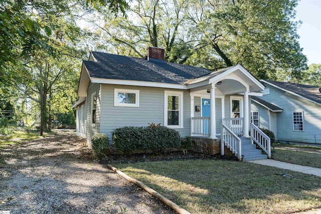 view of front of property with a front lawn