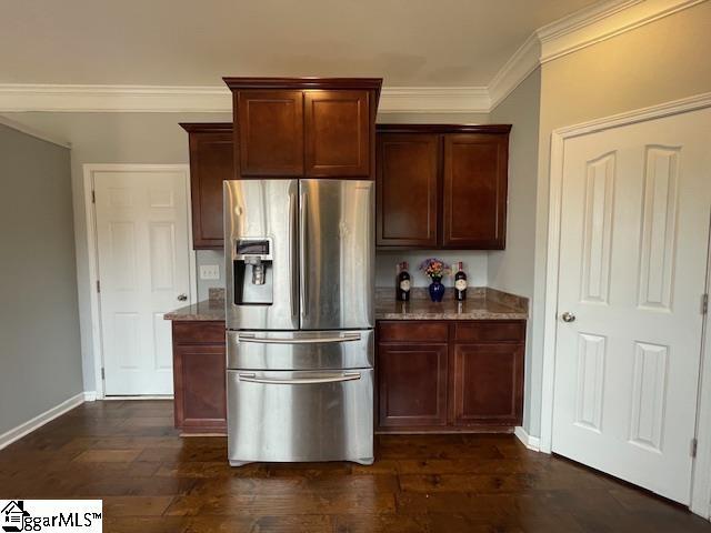 312 Engelmann Ln, Simpsonville, SC 29680 - kitchen featuring stainless steel refrigerator with ice dispenser, dark brown cabinets, dark hardwood / wood-style floors, and ornamental molding